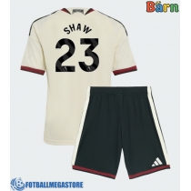 Fotballdrakt Barn Manchester United Luke Shaw #23 Tredjedraktsett 2026-27 Kortermet (+ Korte bukser)